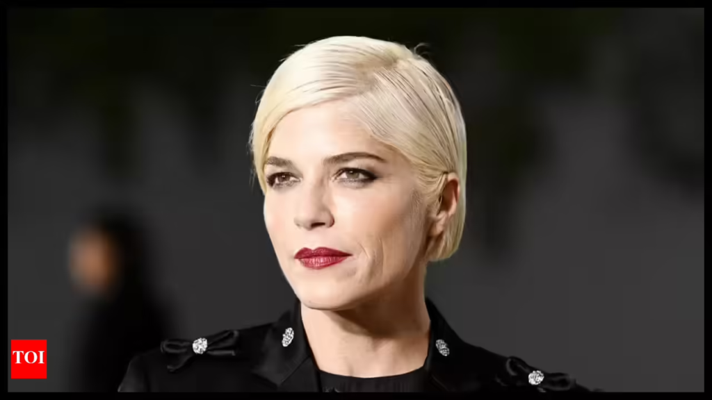 Selma Blair smiling confidently at a public event